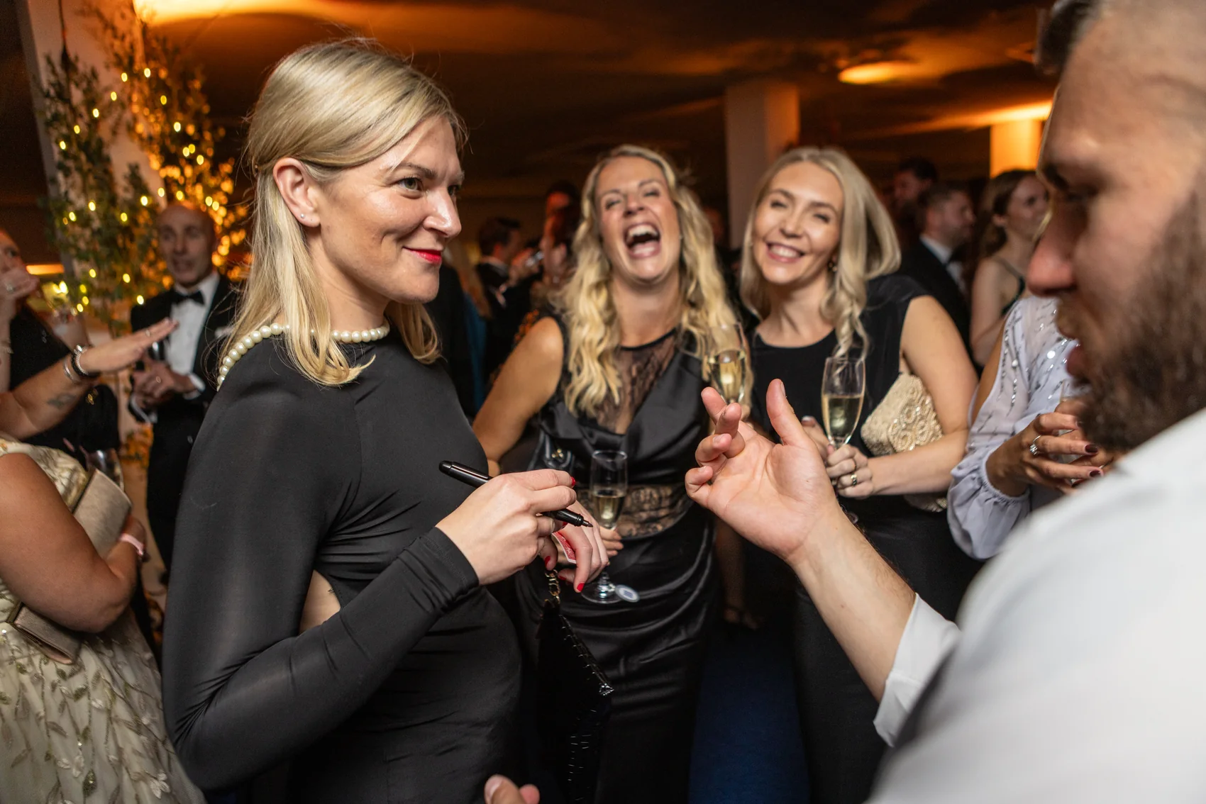 Guests enjoying magic at a private event