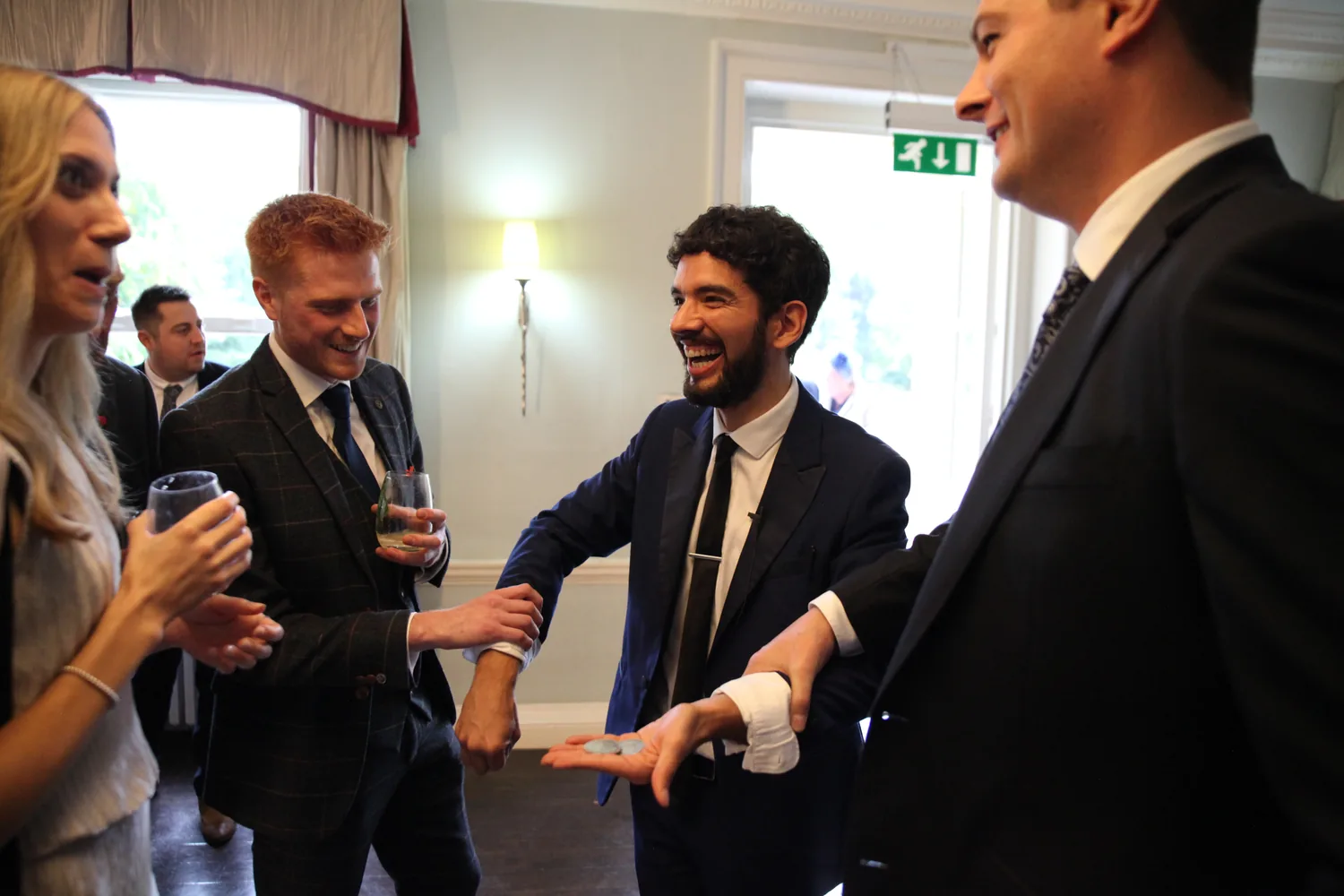 Corporate guests enjoying magic
