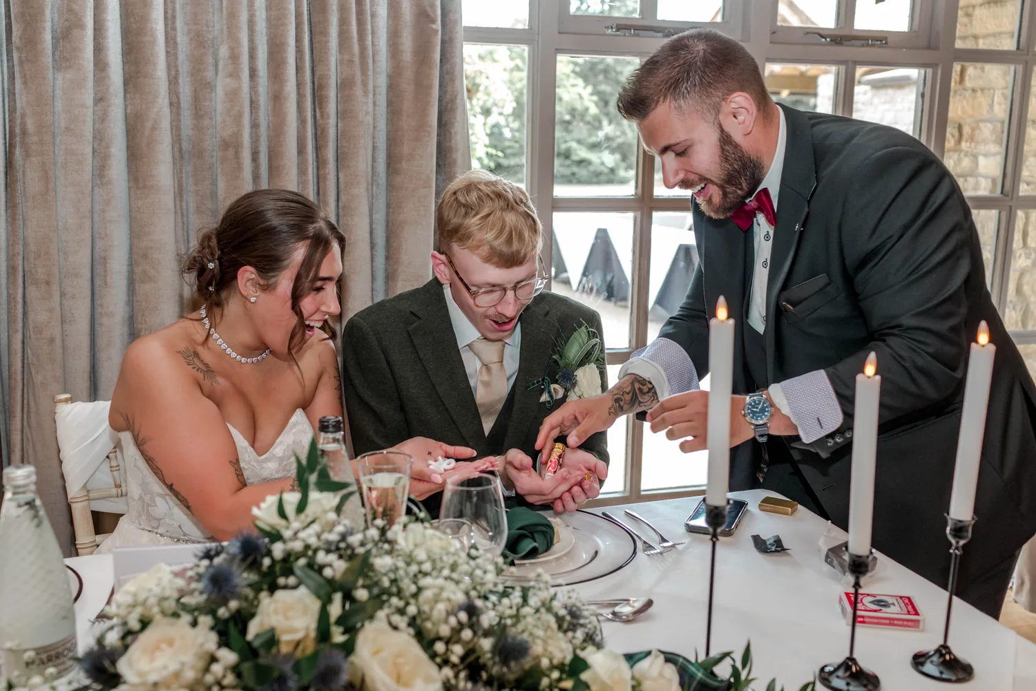 Wedding guests enjoying close-up magic