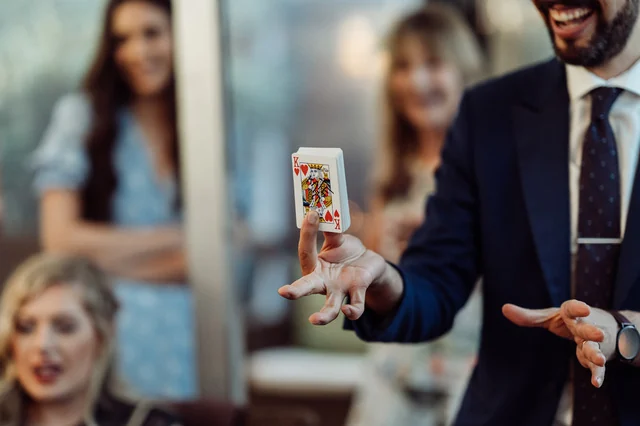 Magician presenting a close-up effect