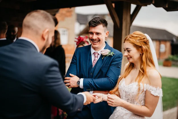 Michael performing for a bride and groom