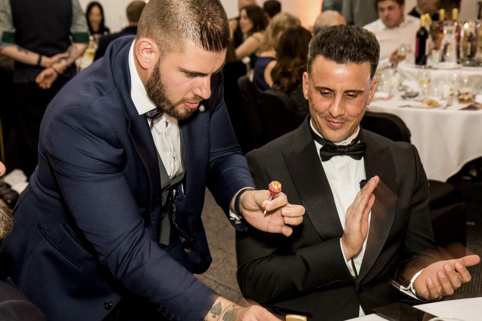 Close-up magic at a dinner table