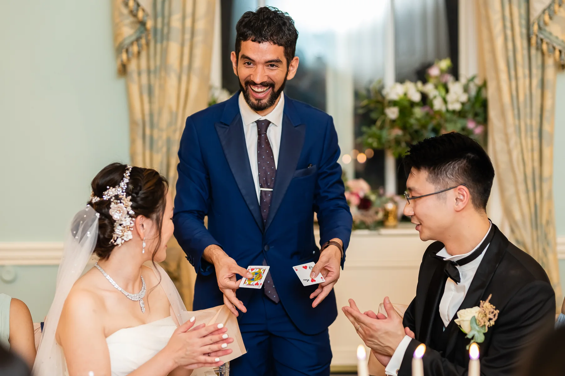 Thomas Dixon performing close-up magic at a wedding